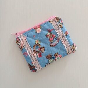 Blue Quilted Pouch with Pink Lace Trim